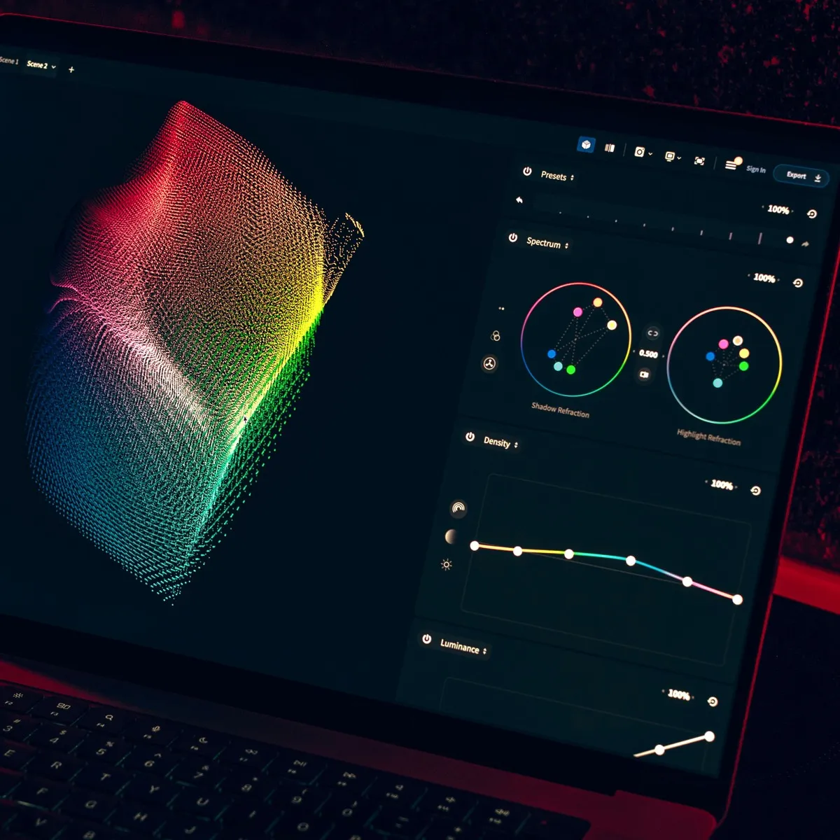 Laptop screen showing a 3D data visualization tool with a colorful point cloud and spectrum controls