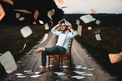 Man with a book on his head