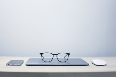 Glasses on laptop
